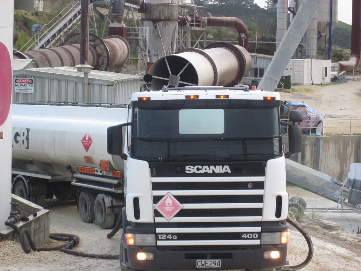 Recovered oil being transferred into a storage tank at the processing yard